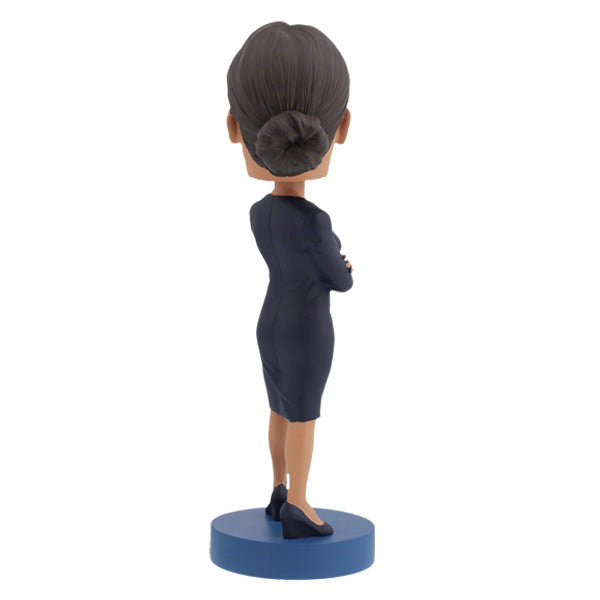 Alexandria Ocasio-Cortez bobblehead displaying intricate details, hand-painted and crafted from heavyweight polyresin with a vibrant finish.