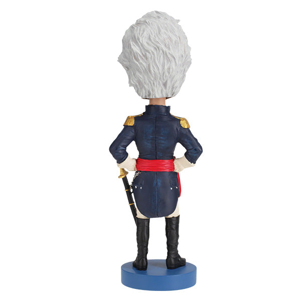 Andrew Jackson v2 Bobblehead crafted from heavyweight polyresin, featuring hand-painted details, displayed on a collector's shelf with a background of books.
