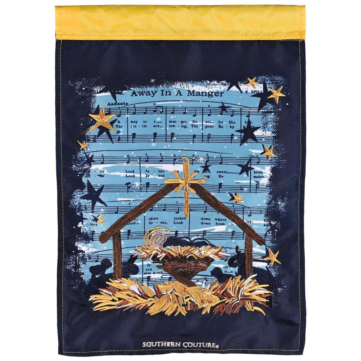 Away In A Manger garden flag, 13x18 inches, featuring festive designs in detailed embroidery and fabric appliques, displayed outdoors.
