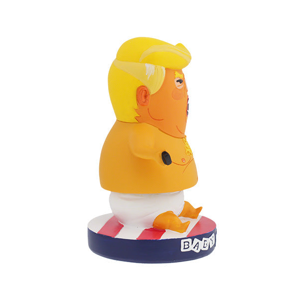 Baby Trump BobbleHIPS collectible bobblehead, humorously designed with vibrant colors, displayed on a desk, ready to entertain and amuse.