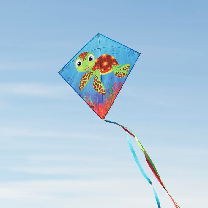 The Baby Turtle diamond kite features a vibrant turtle graphic, colorful tails, and a 30-inch design that makes it perfect for flying in the sky.