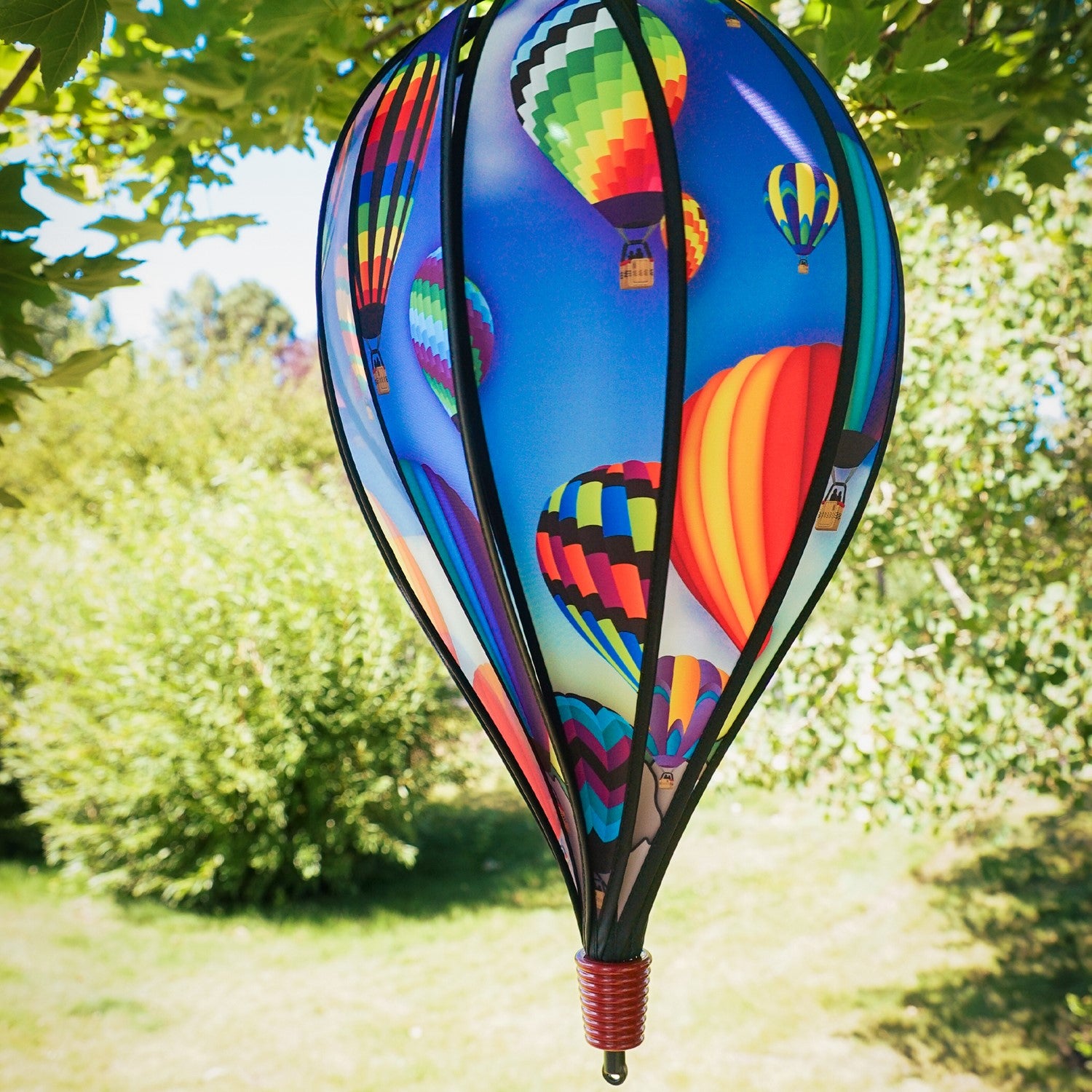 The Balloon Fest 10-Panel Hot Air Balloon Spinner features a bright and colorful design of hot air balloons spinning in the breeze, adding whimsy to your garden decor.