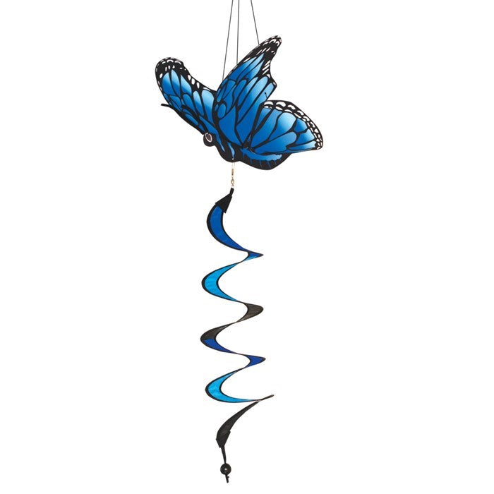 Blue Morpho Theme Twister features a vibrant 3D butterfly design with a curlie tail, spinning in the wind, enhancing a garden setting.