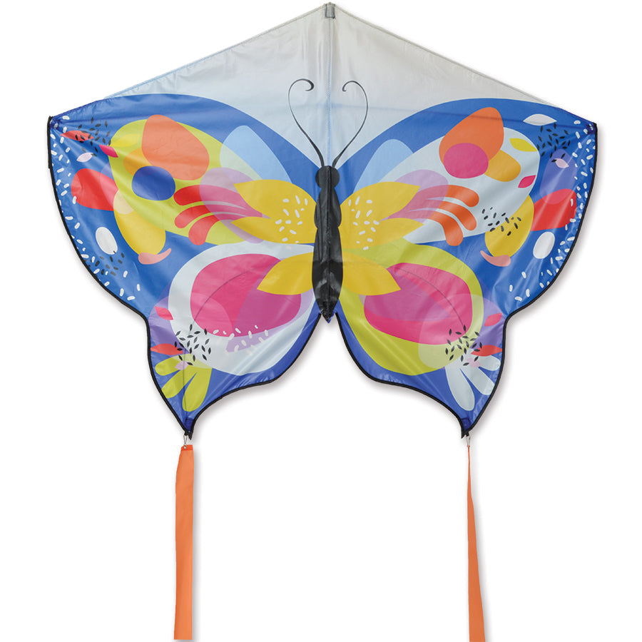 Butterfly Kite - Terrazo with colorful butterfly design soaring in the sky, measuring 52 x 37 inches, showcasing its vivid patterns against a blue background.