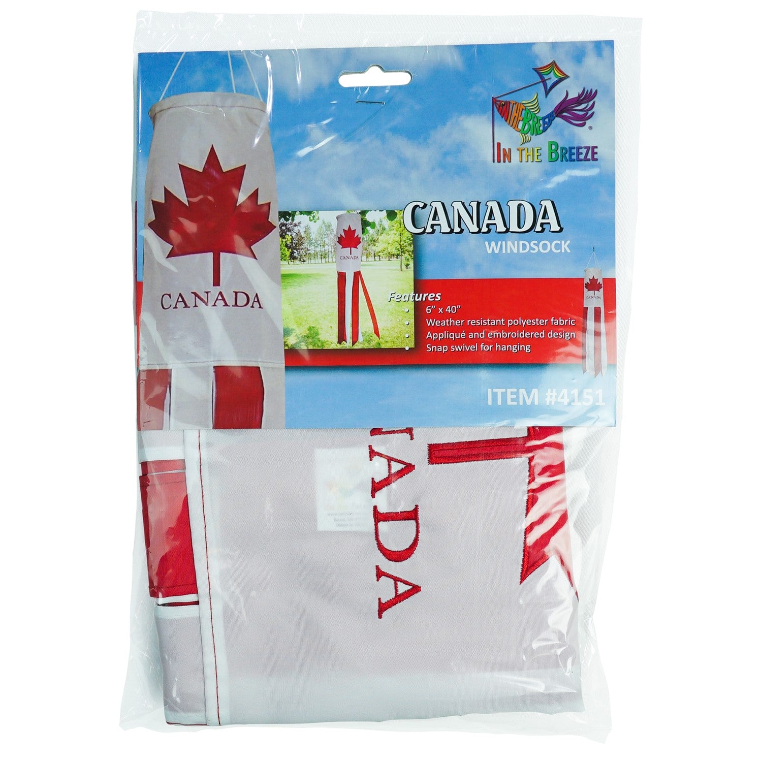 Canada 40 inch windsock with vibrant colors and detailed embroidered graphics fluttering outdoors in a garden setting.