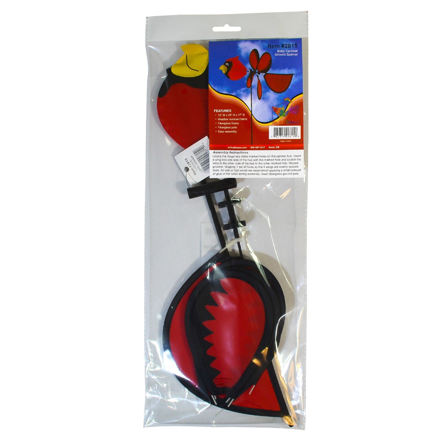 Colorful Cardinal Baby Spinner featuring a bright baby cardinal on a rotating wheel against a lush garden background.