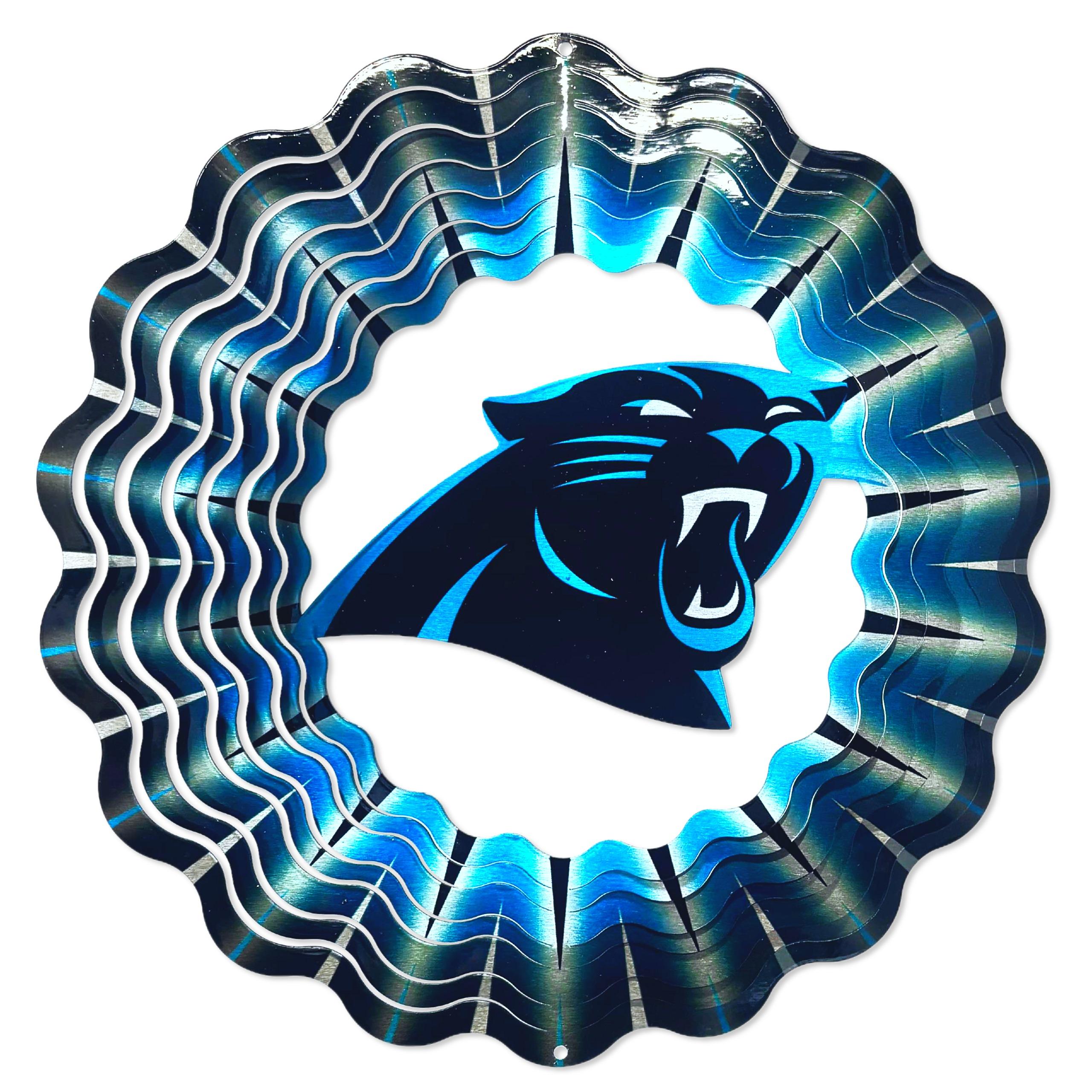12-inch Carolina Panthers NFL Wind Spinner featuring bold team-themed artwork spinning in the breeze in a garden setting.