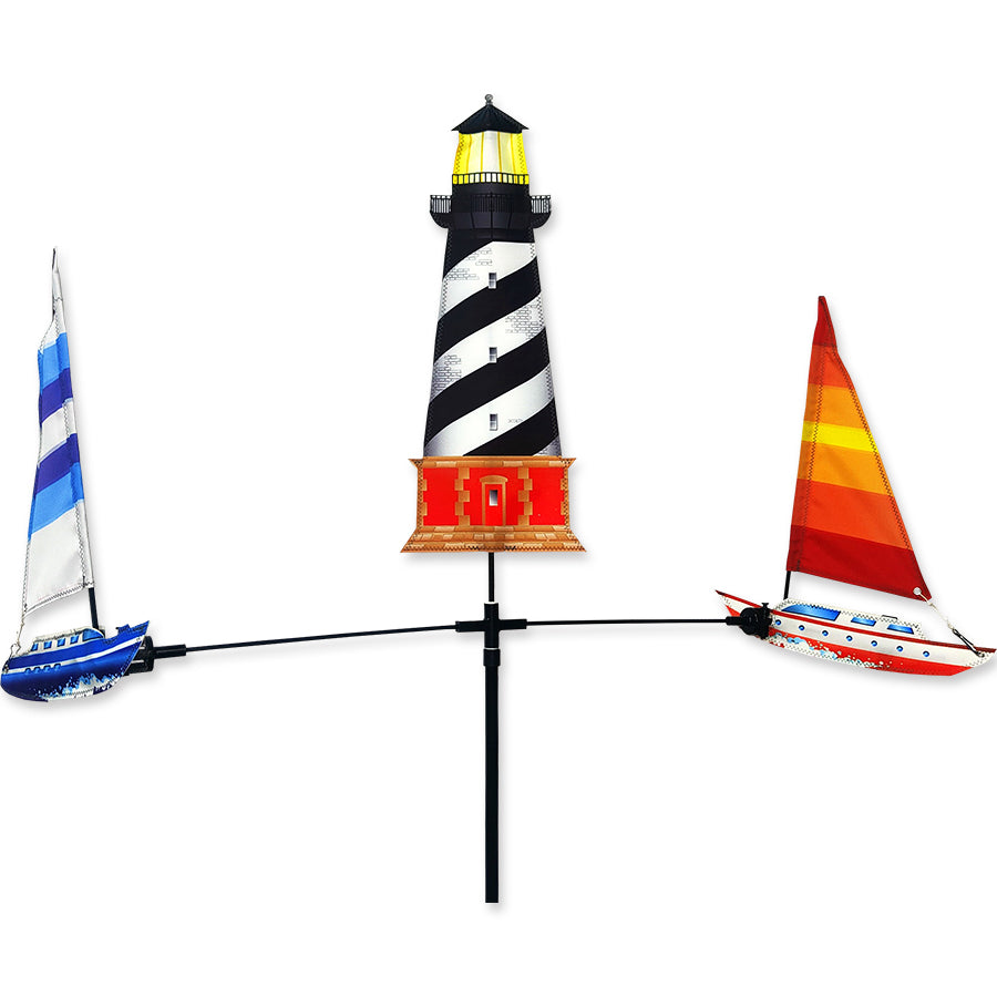 Carousel Spinner - Sailboat garden decoration elegantly spinning in the wind, enhancing outdoor aesthetics with vibrant colors.