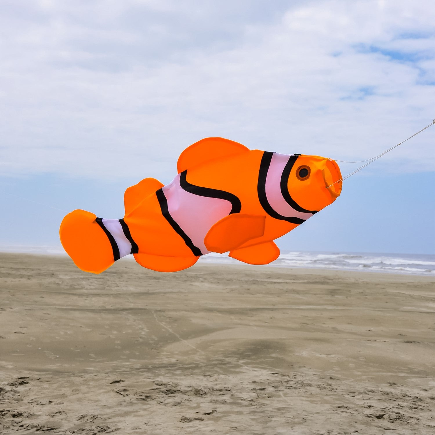 40-inch clownfish fishsock hanging outdoors, showcasing vibrant colors and detailed applique design, perfect for garden decoration.