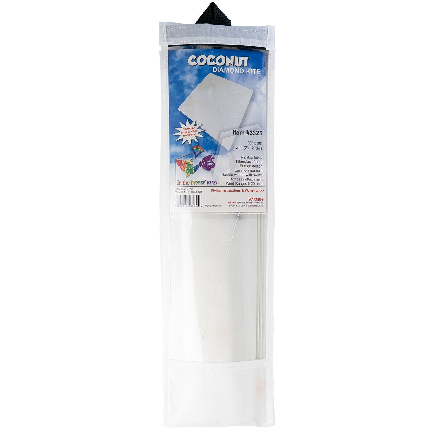Coconut Colorfly 30-inch diamond kite in solid white color with colorful tails displayed against a clear blue sky on a sunny day.