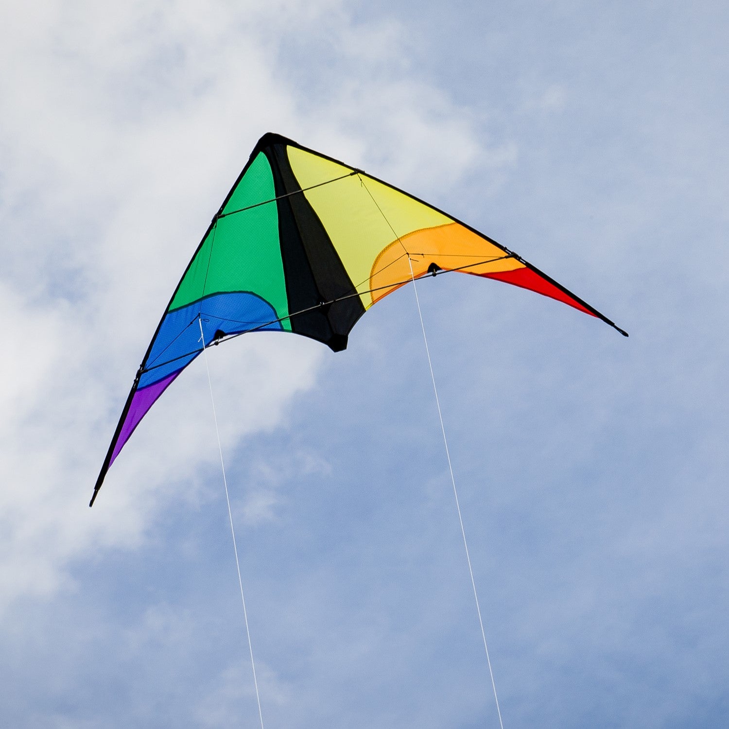 Colorwave 48" Sport Kite with a colorful rainbow design, displayed soaring in a clear blue sky, showcasing its vibrant colors and dynamic flying ability.