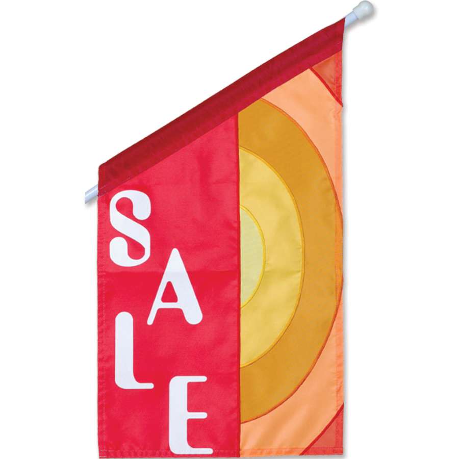 Commercial Flag featuring a vibrant applique design displayed prominently on a flagpole outside a business storefront.