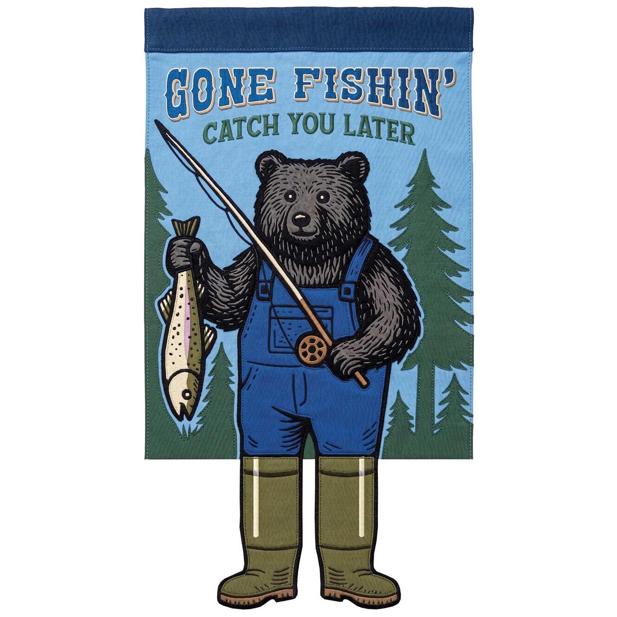 Crazy Leg Bear Gone Fishin' garden flag featuring a playful bear with dangling legs, displayed in an outdoor garden setting.