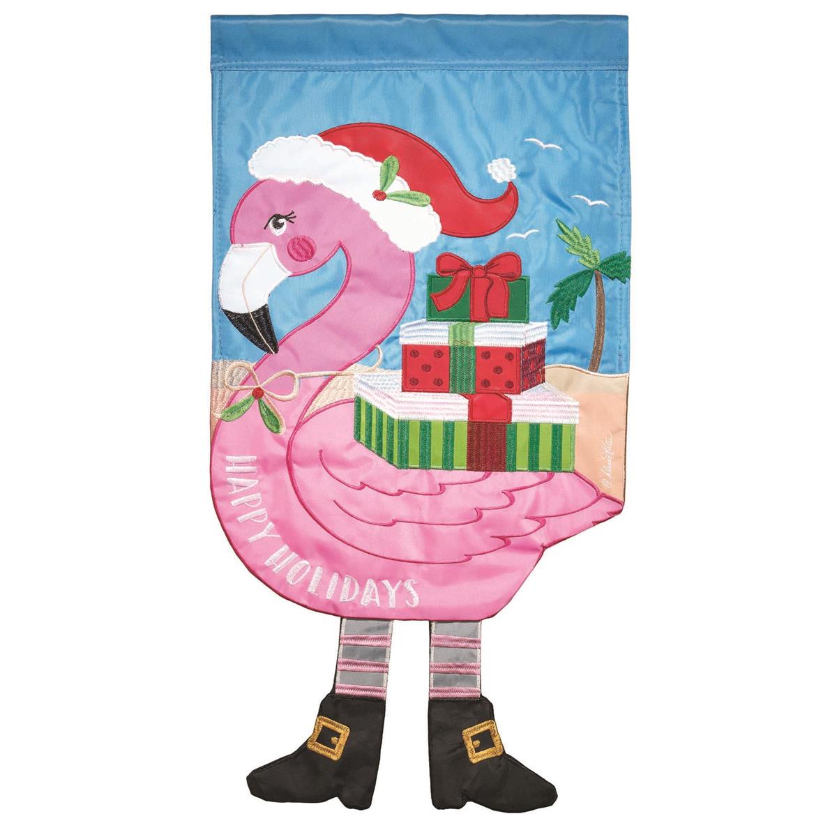 Crazy Leg Holiday Flamingo Garden Flag featuring a whimsical flamingo with boot-clad legs displayed outdoors, perfect for Christmas cheer.