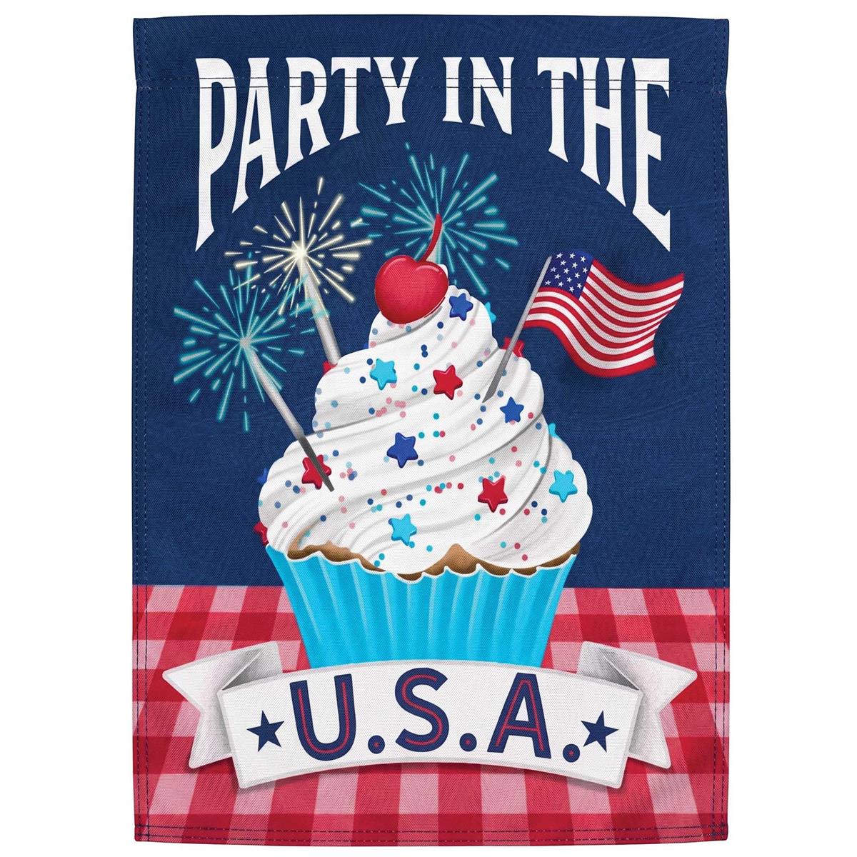 Cupcake Party In The U.S.A. garden flag with colorful cupcake designs displayed in an outdoor garden setting, made of heavy-duty polyester.