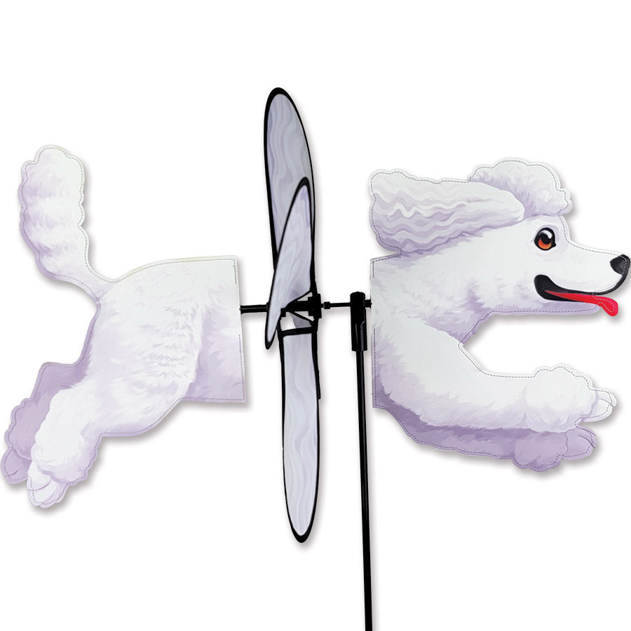 Deluxe Petite Spinner - Poodle features vibrant design with spinning action displayed in outdoor garden setting.