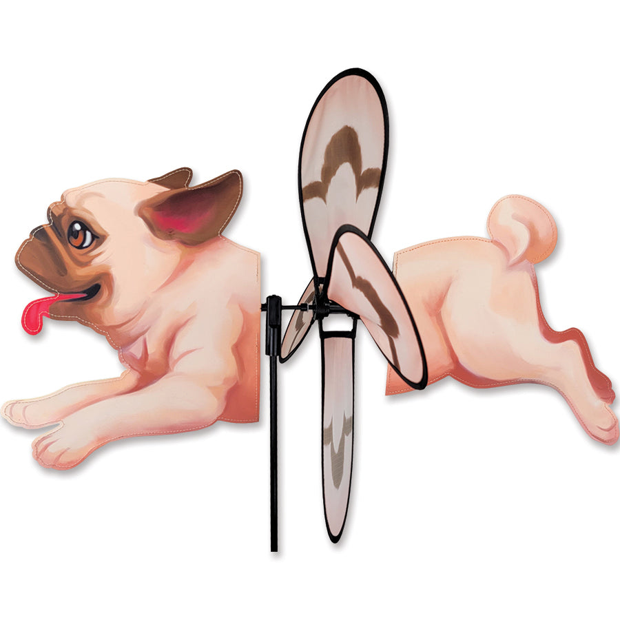 Deluxe Petite Spinner featuring an adorable pug design, spinning delightfully in a vibrant garden setting with flowers around it.