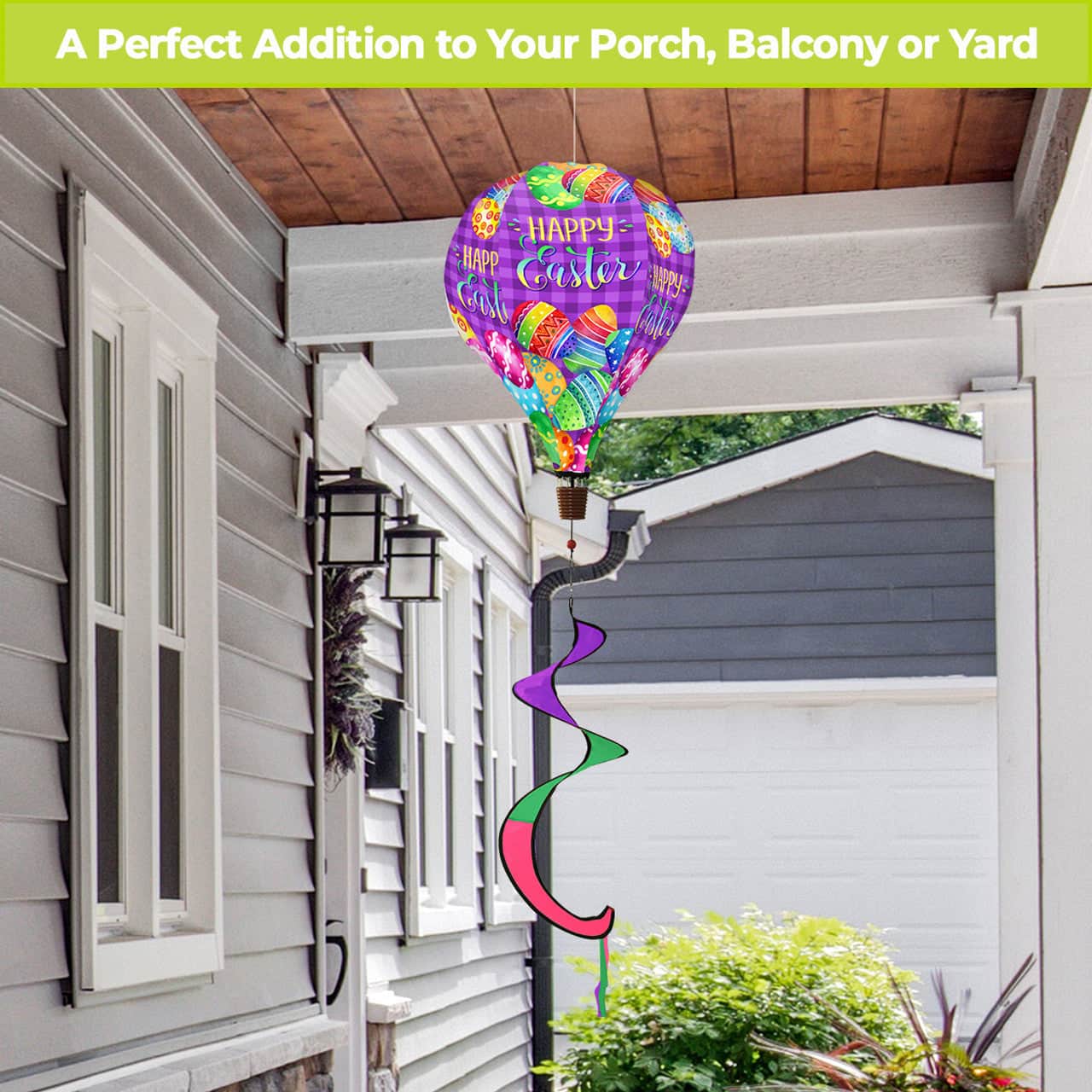 Hot air balloon spinner with pastel Easter eggs, weather-resistant polyester, and breezy motion for festive spring and Easter outdoor garden décor.