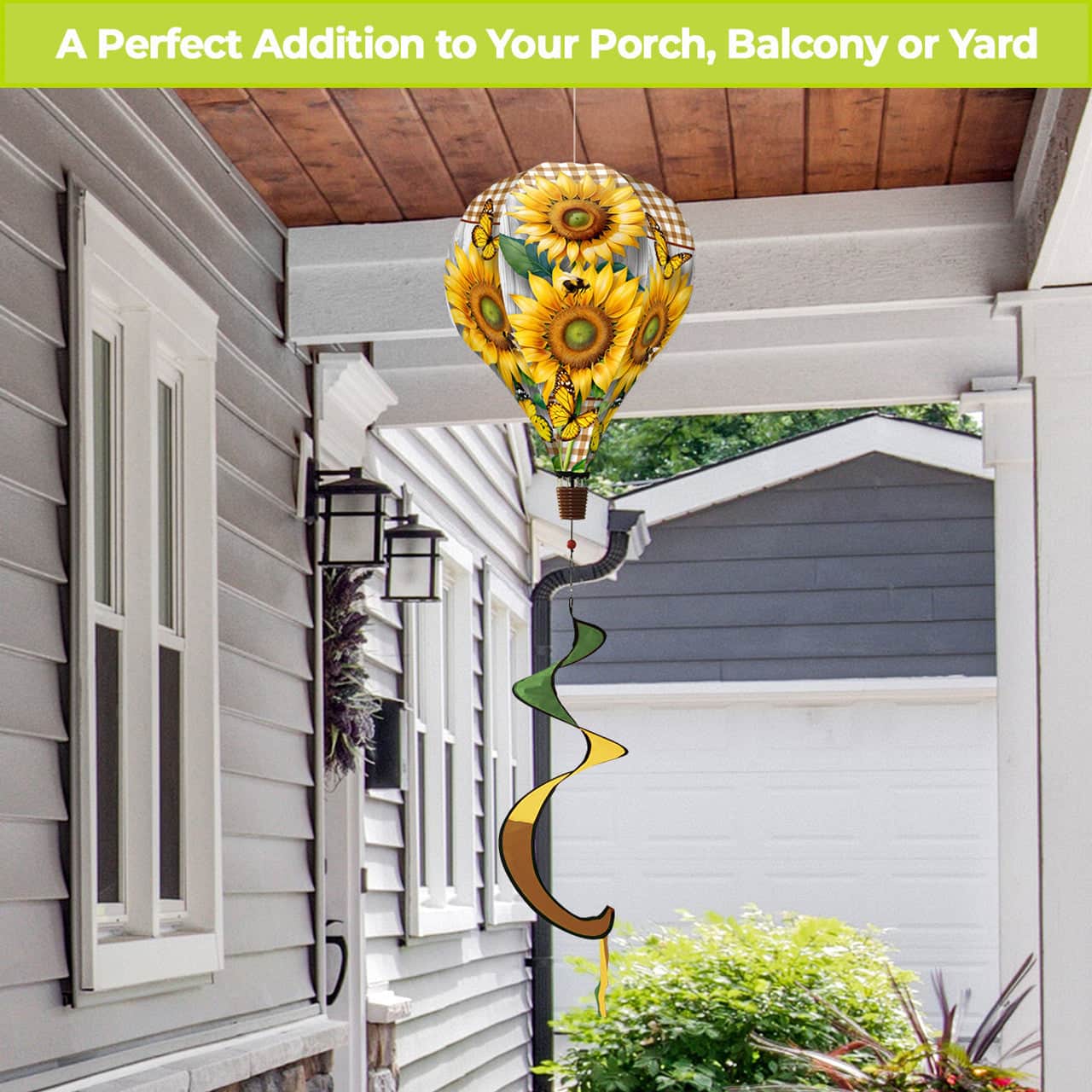Double sunflower hot air balloon spinner with bright yellow blooms, durable polyester, and breezy motion for vibrant, garden-inspired outdoor décor.