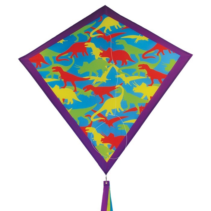 Dinosaur Camouflage 30-inch diamond kite with colorful T-Rex and Pterodactyl designs flying in a clear blue sky during a sunny day.