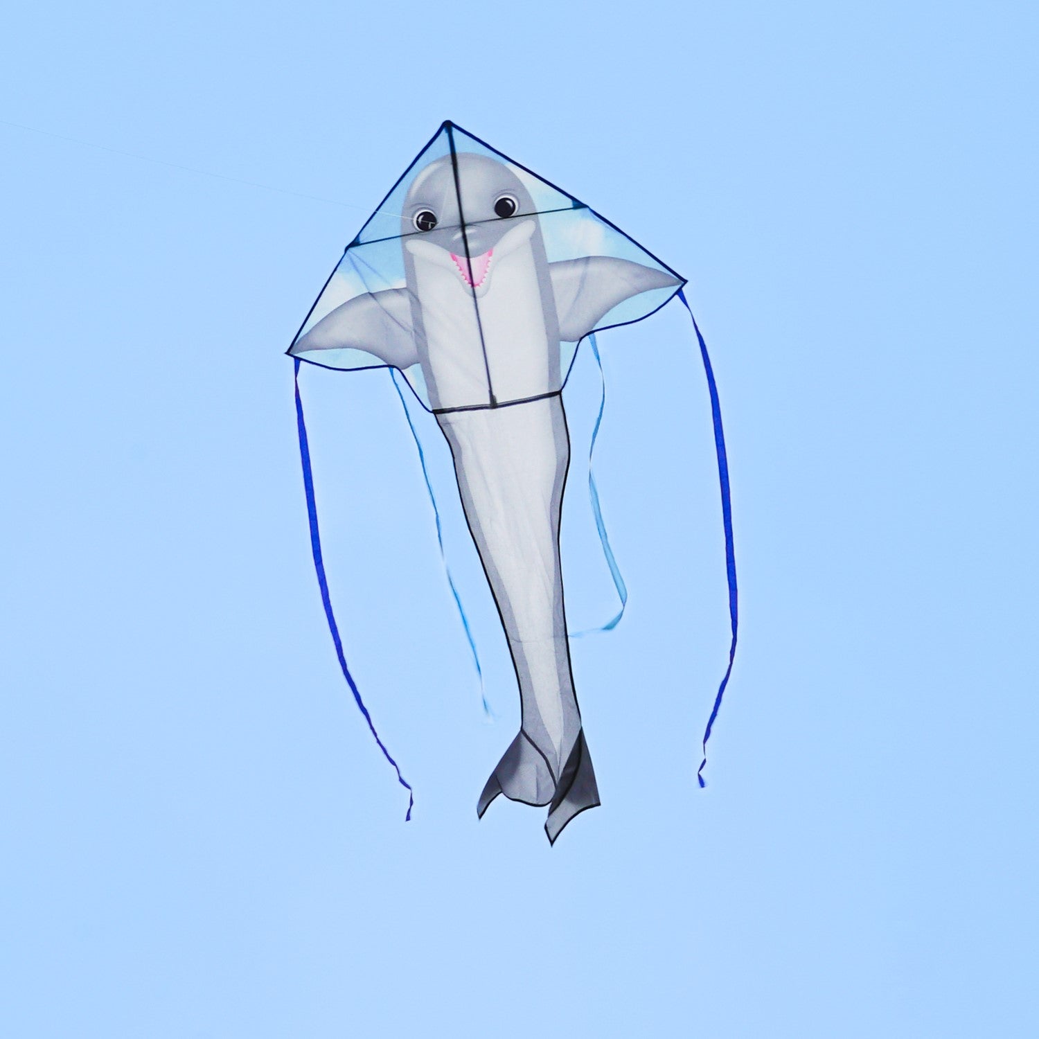 Dolphin 45-inch Fly-Hi Kite flying high in a blue sky, featuring a vibrant dolphin design and colorful streamer tails.