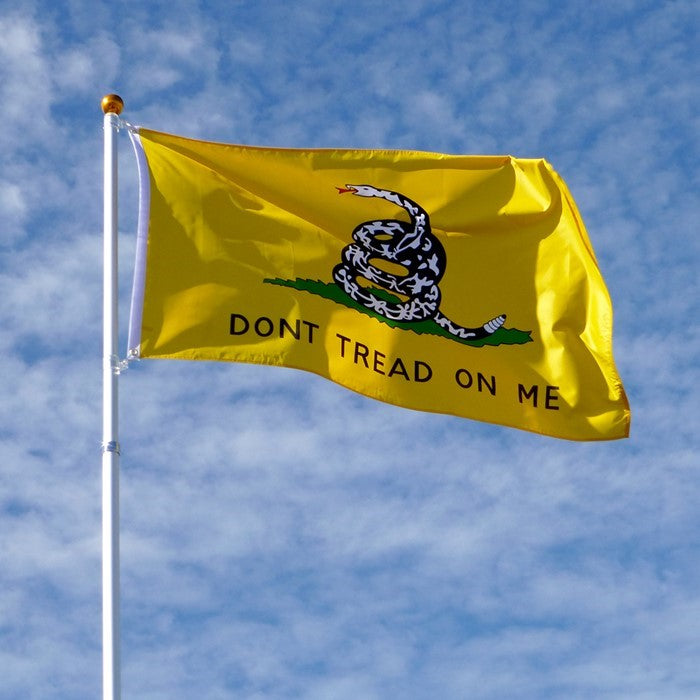 This Don't Tread On Me 3x5 Grommet Flag features a detailed Gadsden rattlesnake design. Ideal for outdoor display, showcasing American pride and freedom.