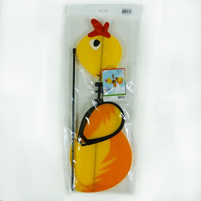 Duck Baby Spinner with bright colors and a 12-inch wheel displaying in a garden, featuring a baby duck design and fiberglass pole.