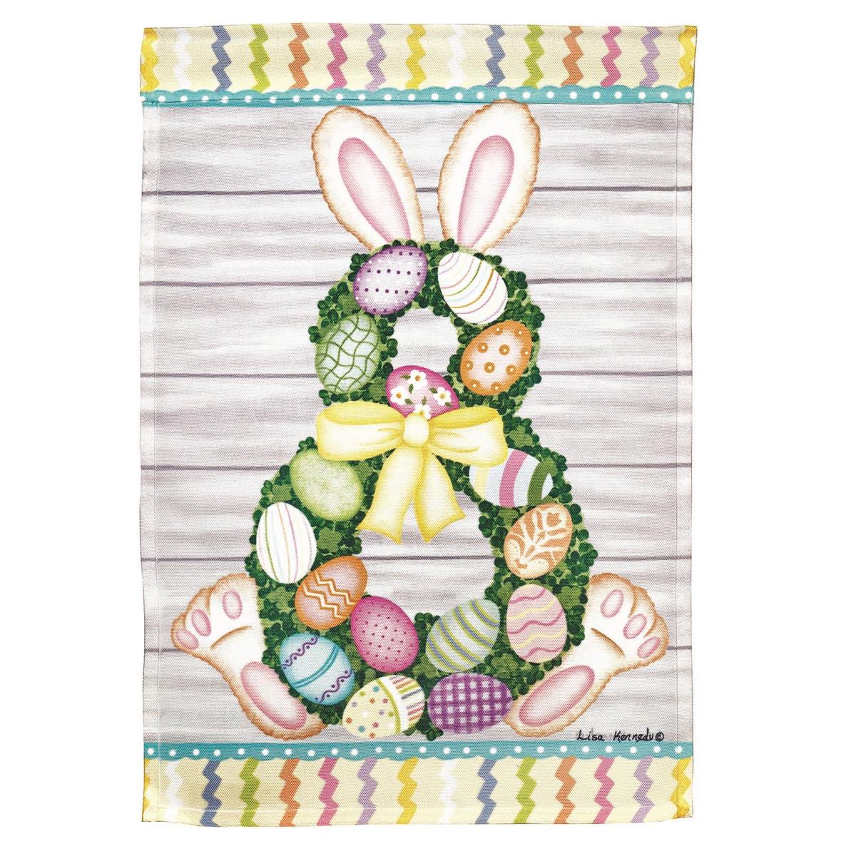 Easter Bunny Wreath Garden Flag featuring a colorful wreath displayed outdoors, able to enhance any garden or porch setting for springtime festivities.