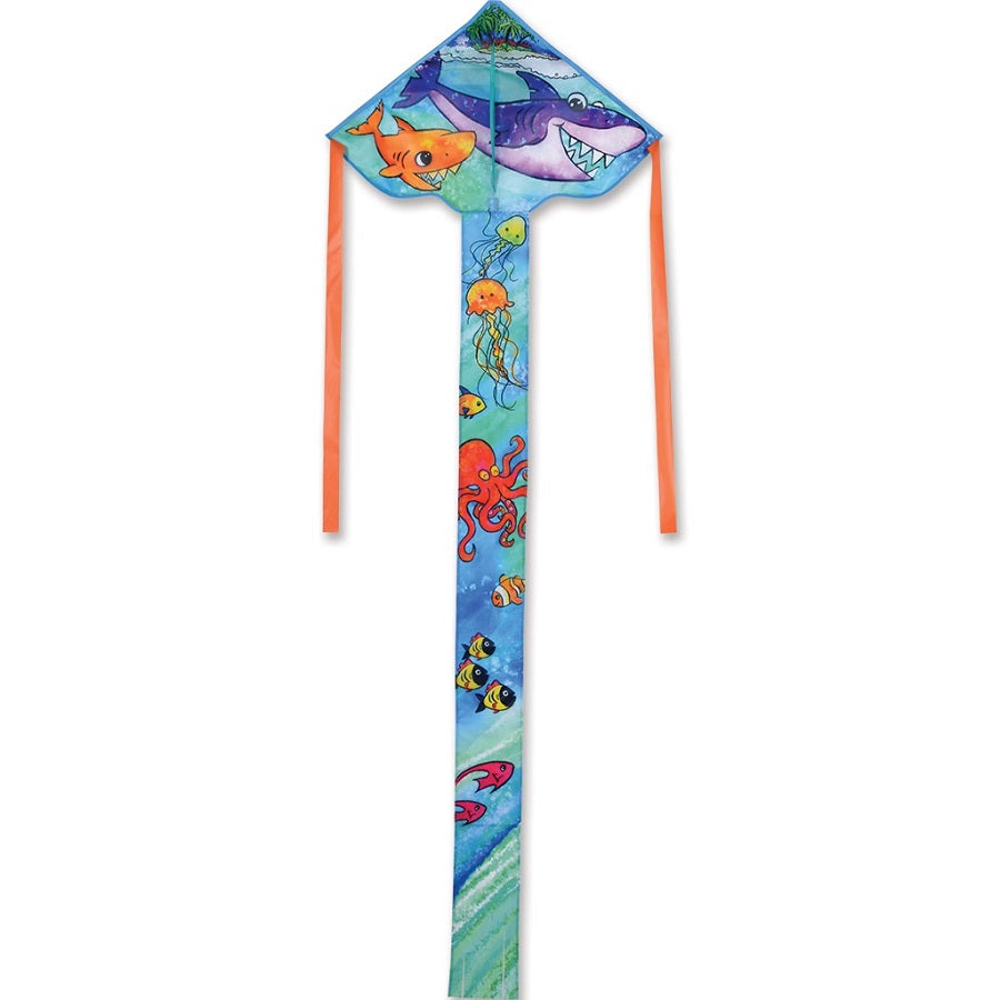 Easy Flyer Kite - Shark Family, measuring 48x22 inches, showcasing a colorful shark family design, soaring gracefully against a blue sky.