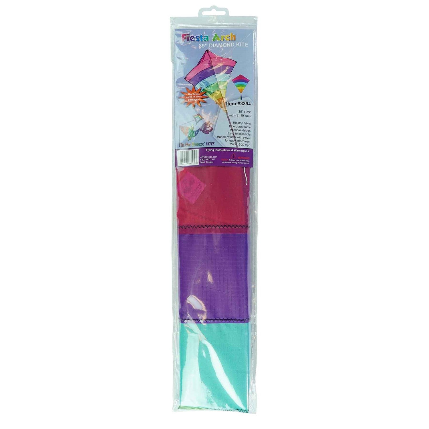 Fiesta Arch 39" Diamond Kite with colorful design flying high against a bright blue sky during outdoor family fun.