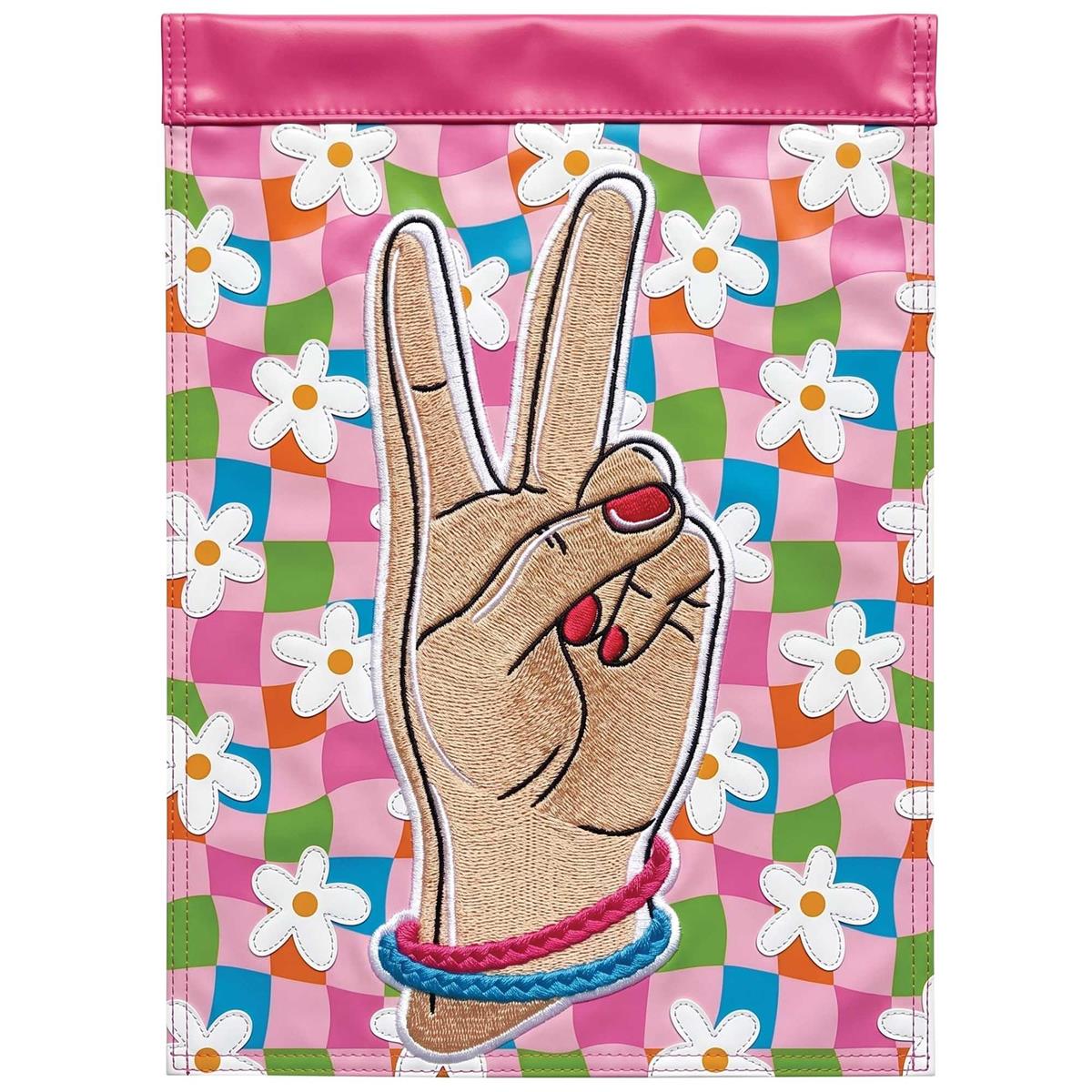 Floral Peace Garden Flag featuring colorful flowers on a double-sided design, beautifully displayed outdoors in a garden setting.