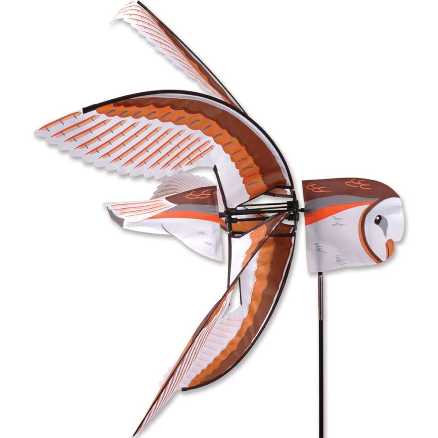 Flying Barn Owl Spinner made of vivid colors and weather-resistant metal, displayed in a garden catching the wind with its intricate design.