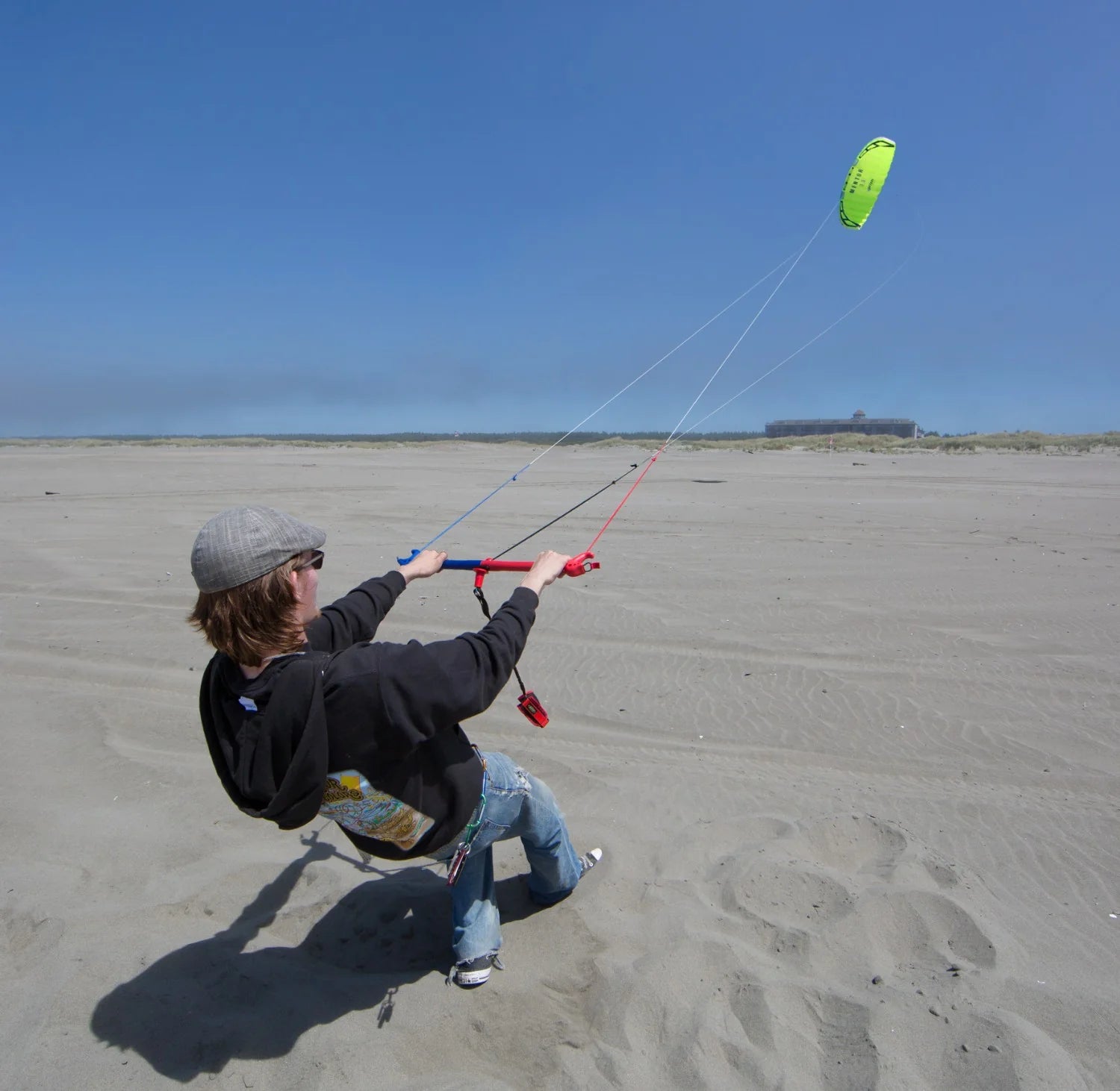 Three-line traction kite with water-relaunchable design, advanced control features, and smooth power delivery for land and water adventures.