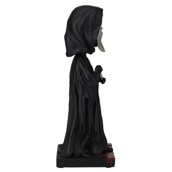 Ghost Face Glow in the Dark Bobblehead featuring the iconic masked character in a detailed design, glowing in a dark setting.