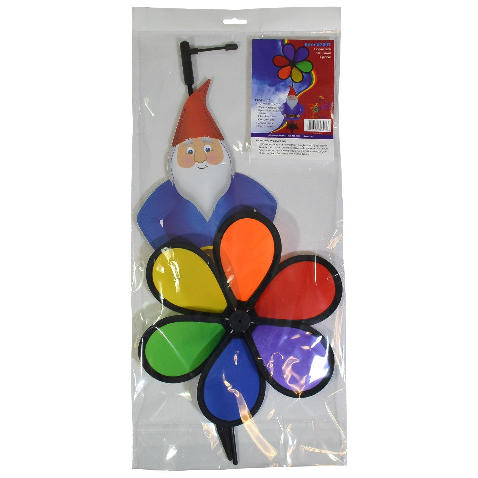 Gnome with 10-inch Rainbow Flower Spinner, featuring a whimsical design to brighten gardens, displayed outdoors with colorful motion in the breeze.