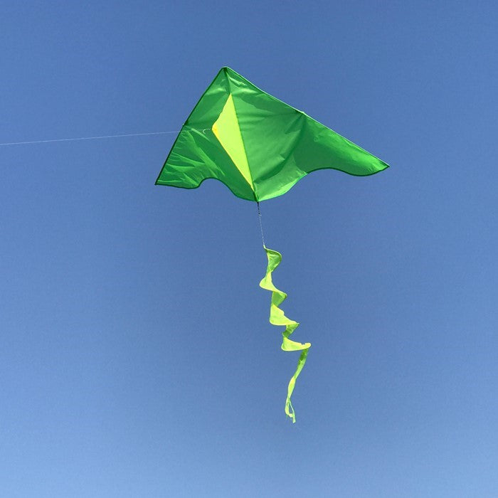 Green Colorblock Delta Kite with Yellow Twister Tail soaring in a clear blue sky during a sunny day, showcasing its vibrant colors.