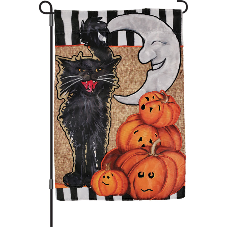 Halloween Cat and Moon garden flag displaying a playful black cat on a crescent moon in vibrant colors, set against a spring garden backdrop.