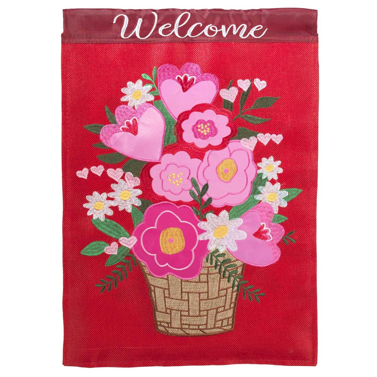 Happy Valentine Day Basket Garden Flag featuring a colorful basket of flowers and hearts displayed in a garden setting, measuring 13x18 inches.