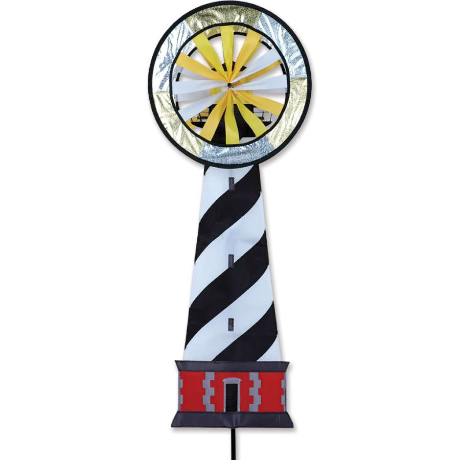 Hatteras Lighthouse Spinner displaying vibrant colors and intricate lighthouse design spinning gracefully in an outdoor garden setting.