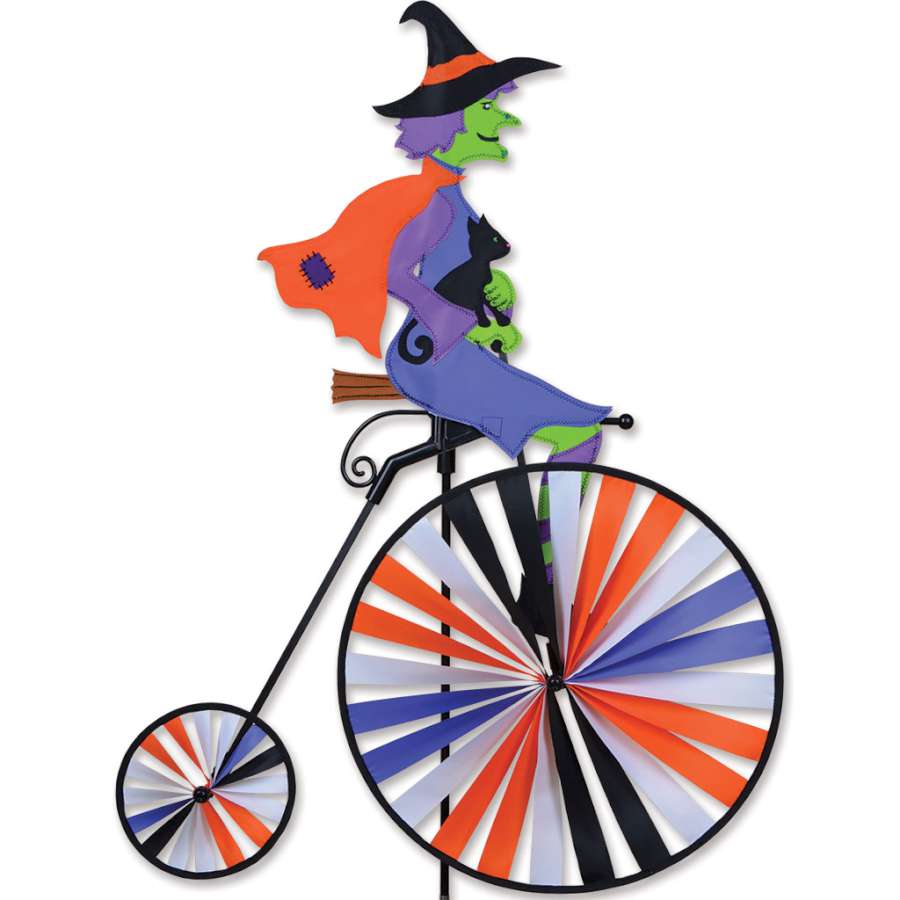 High Wheel Bike Spinner with vibrant autumn colors in a garden setting, showcasing its spinning mechanism against a blue sky.