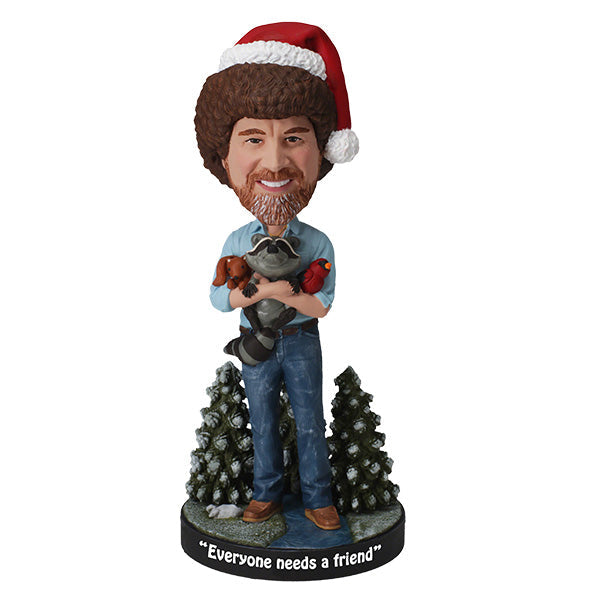 Holiday Bob Ross Bobblehead featuring Bob Ross in a winter sweater, approximately 8 inches tall, smiling joyfully.