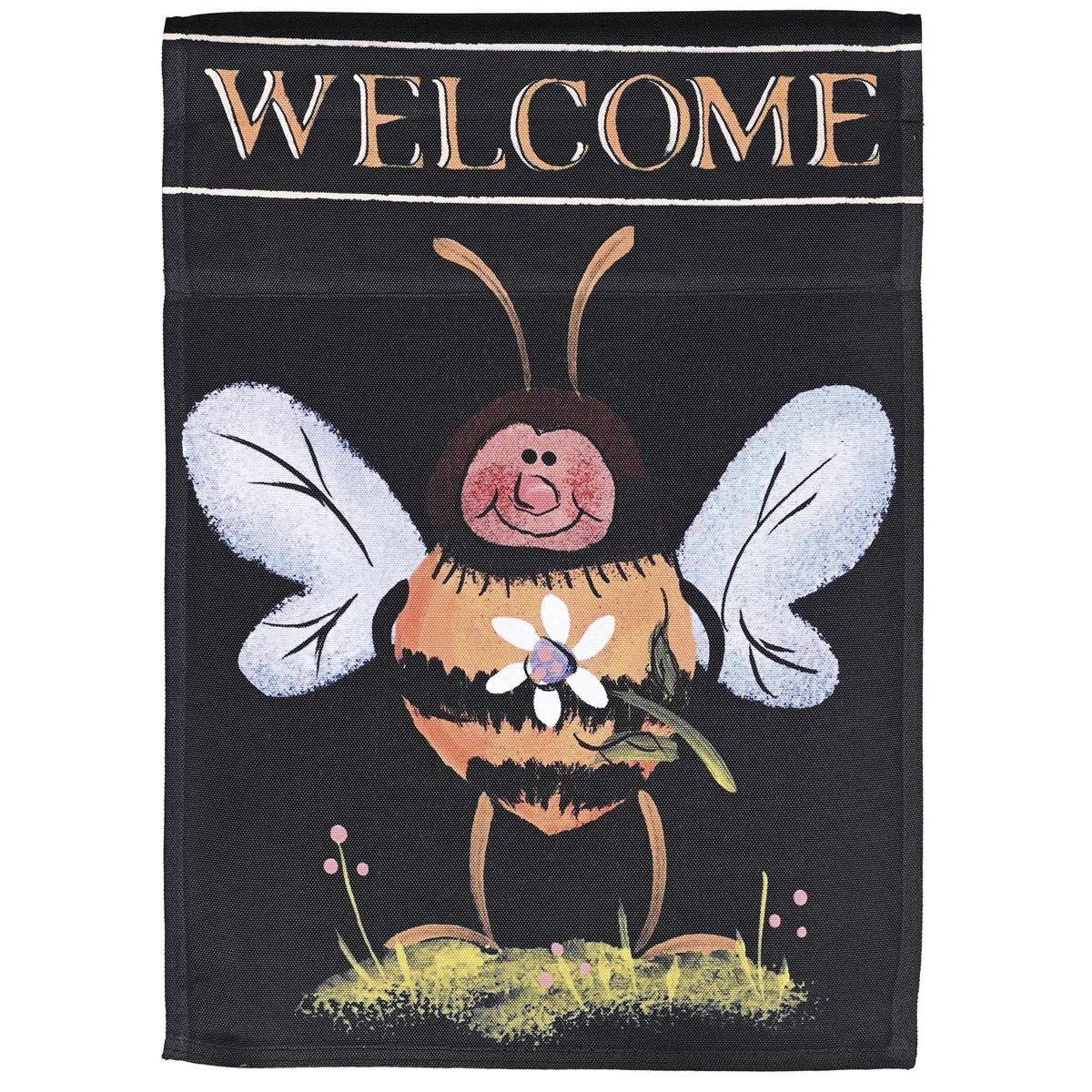 Honey Bee garden flag showcasing a vibrant bee design, illuminated to create a stained glass effect displayed in a garden setting.