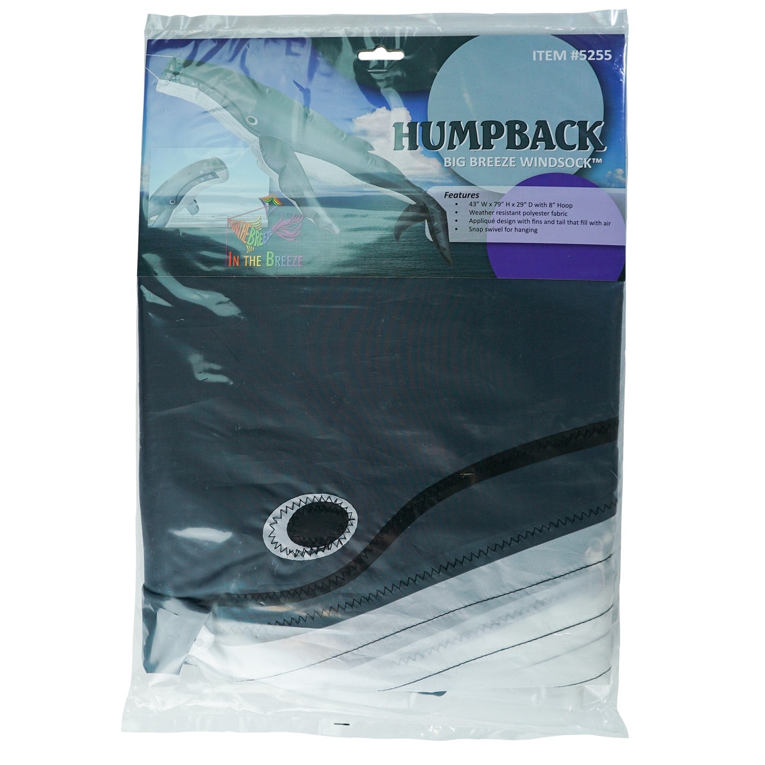 Humpback Big Breeze WindsockTM in a vibrant 3D design displayed in an outdoor garden, showcasing a whale in motion against the breeze.