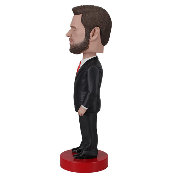 JD Vance Bobblehead standing 8 inches tall, meticulously detailed with a lively spring-mounted head, perfect for display in any collection.