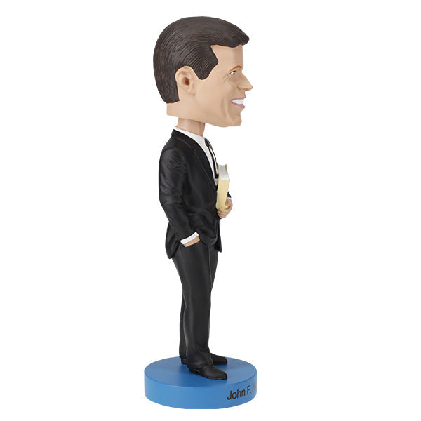John F. Kennedy v3 bobblehead standing 7 inches tall, depicted holding his book 'Profiles in Courage', intricately hand-painted for collectors.