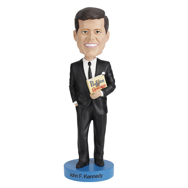 John F. Kennedy v3 bobblehead standing 7 inches tall, depicted holding his book 'Profiles in Courage', intricately hand-painted for collectors.