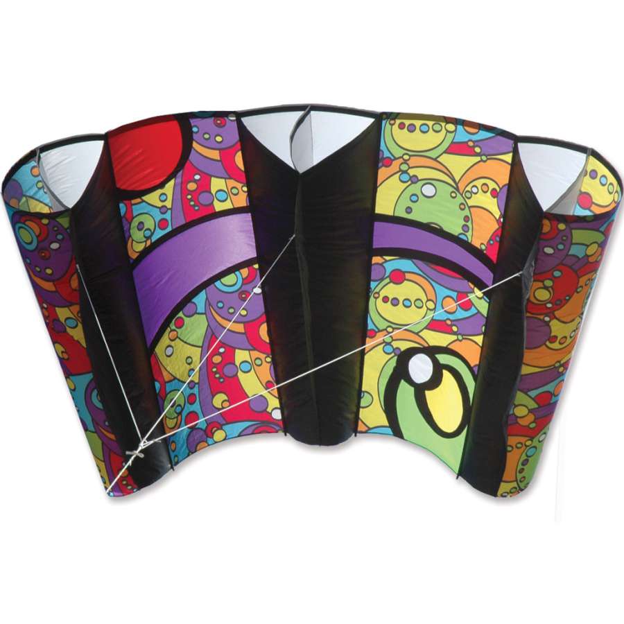 Jumbo Power Sled 36 kite in Rainbow Orbit flying high against a clear blue sky, showcasing its vibrant colors and large size.