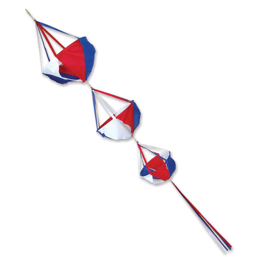 Jumbo Spinnie Set featuring colorful, spinning flags with matching streamer tails displayed outdoors in a garden setting.