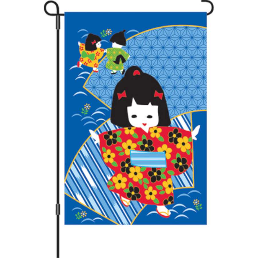 12 in. Kimono Kids garden flag displaying playful and colorful designs in a garden setting, perfect for outdoor decoration.