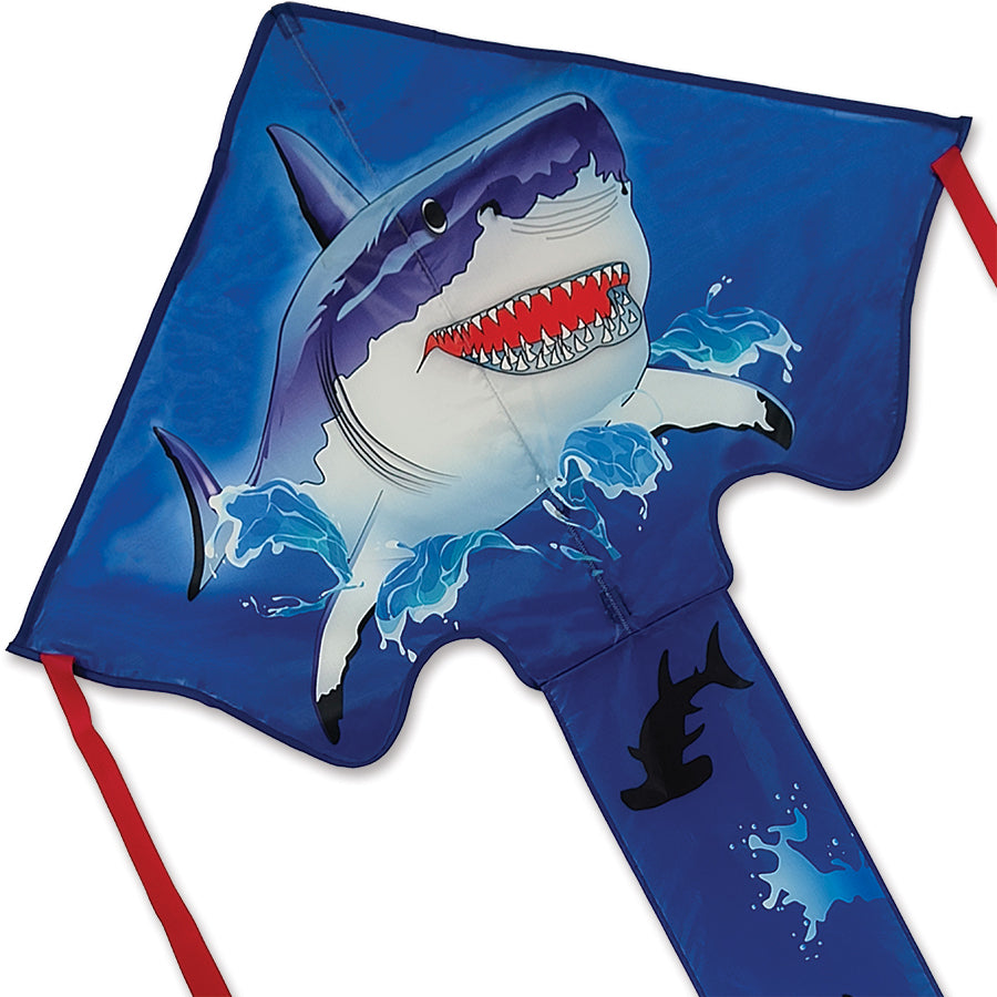 Large Easy Flyer Kite - Shark with vibrant shark design soaring high against a clear blue sky, showcasing its large 46 x 90 in. size.